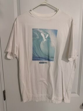American Eagle Outfitters White Tee with Blue Wave Graphic